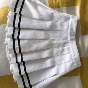 White tennis skirt w/ black trim Size 4
